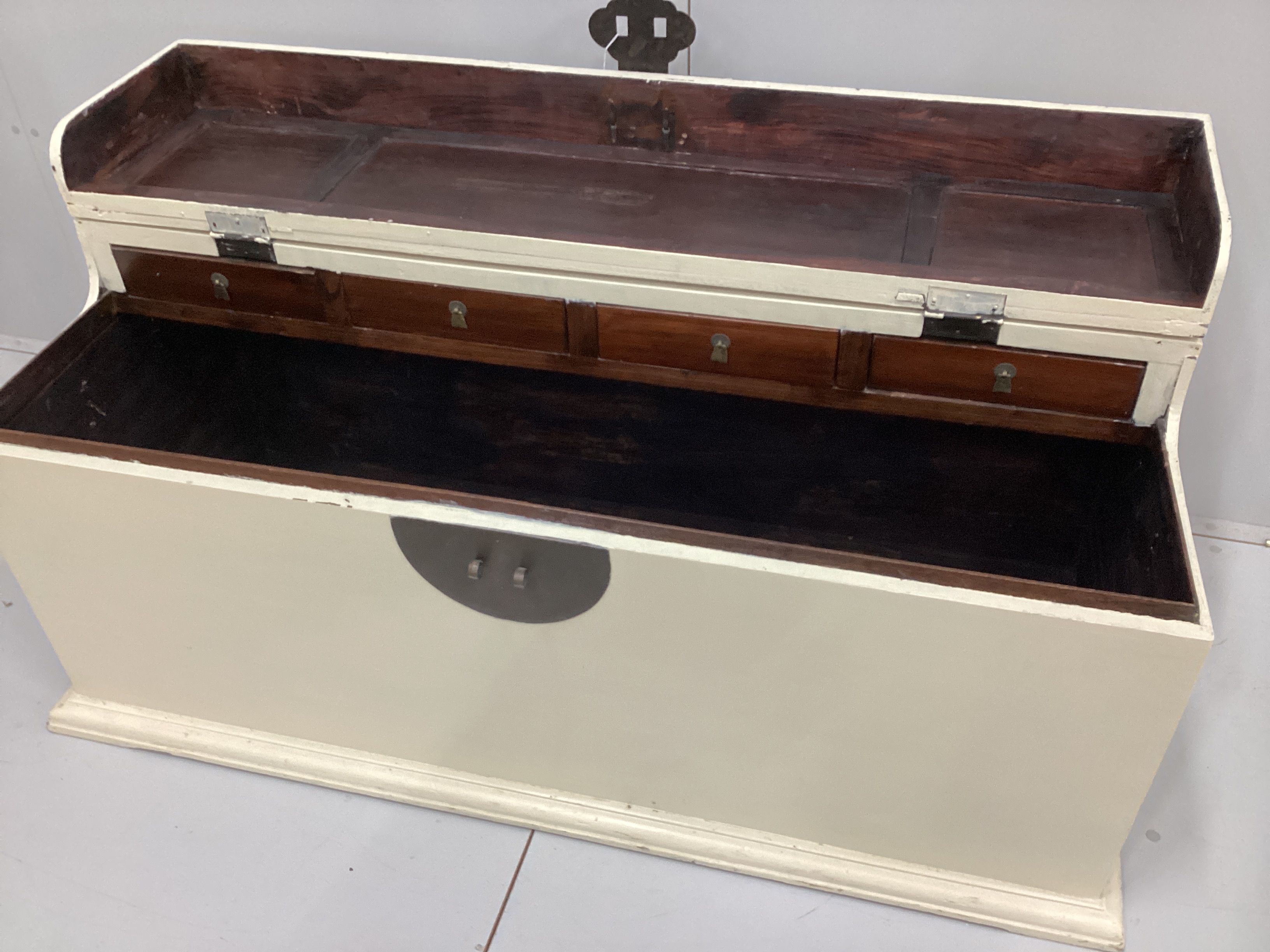A Chinese hardwood trunk, later painted, length 136cm, depth 57cm, height 61cm